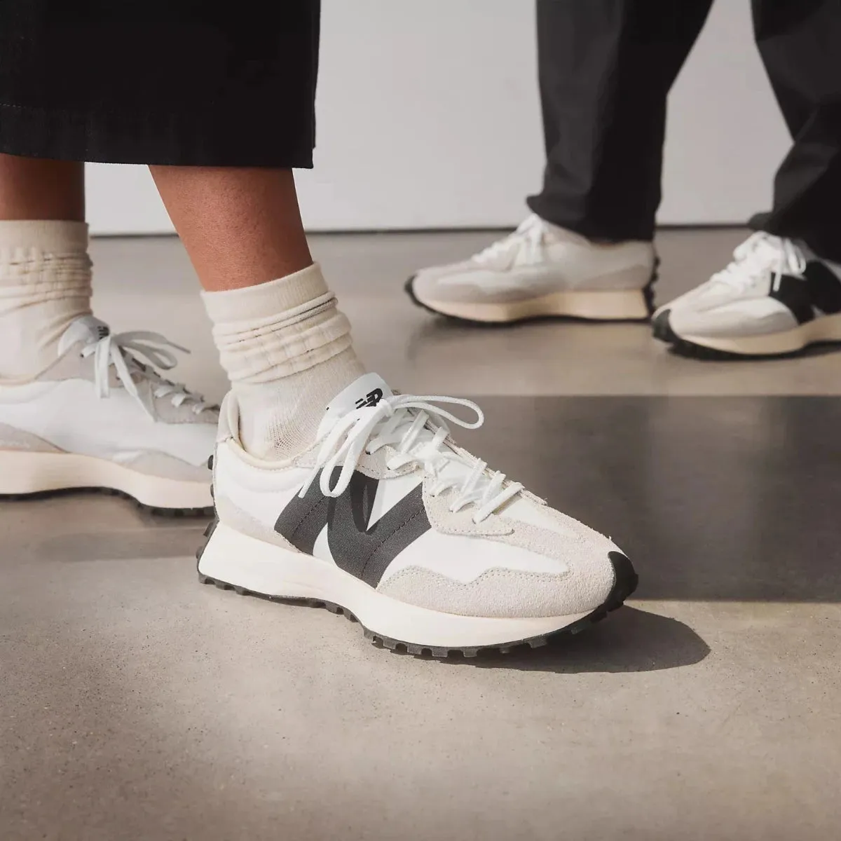 New Balance Women's 327 in Sea Salt with White and Black High Grip System Protective Finish Functional Minimalist